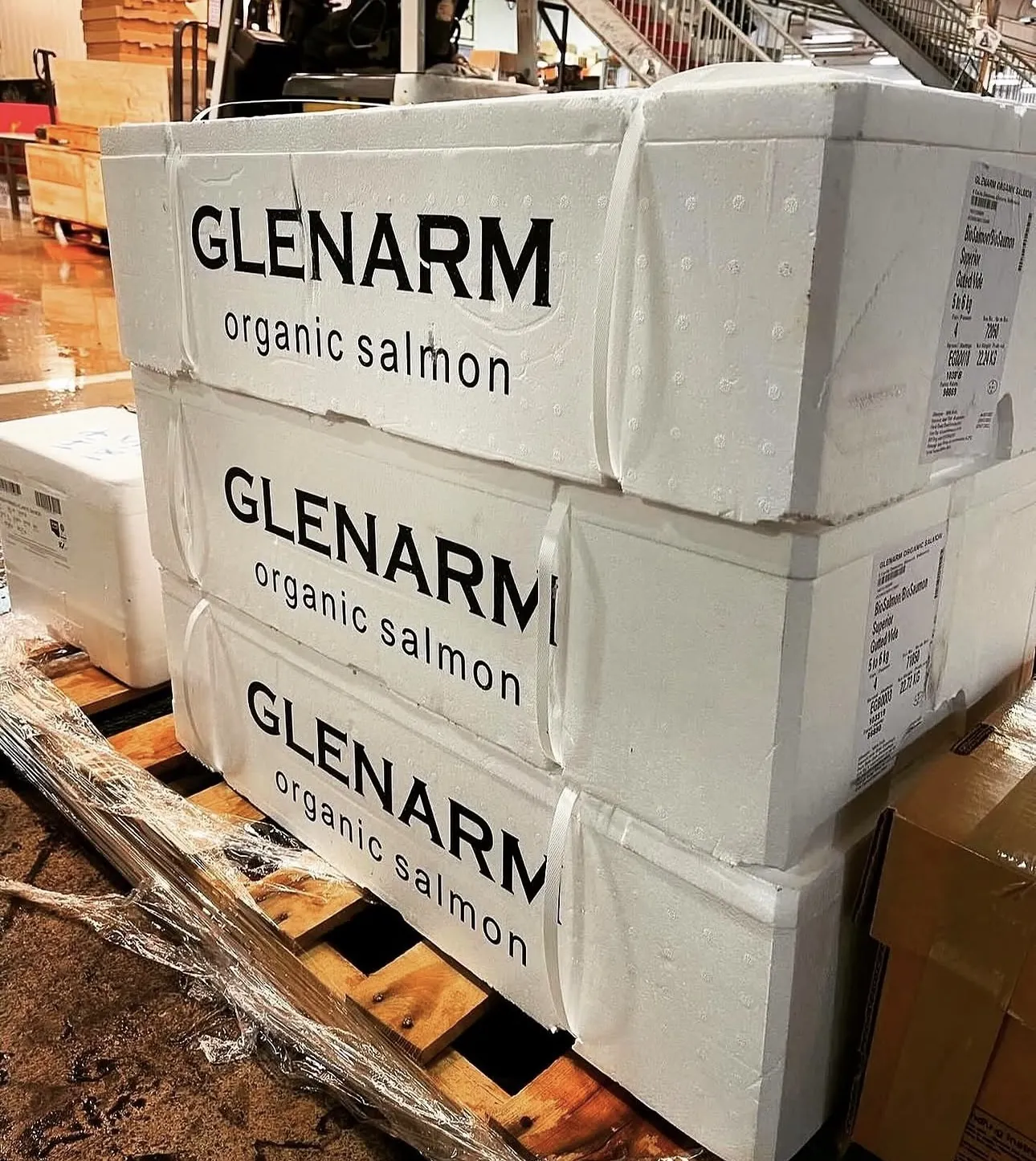 Organic salmon boxes at the seafood market